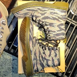 Boy's Dr Martens camo combat boots.